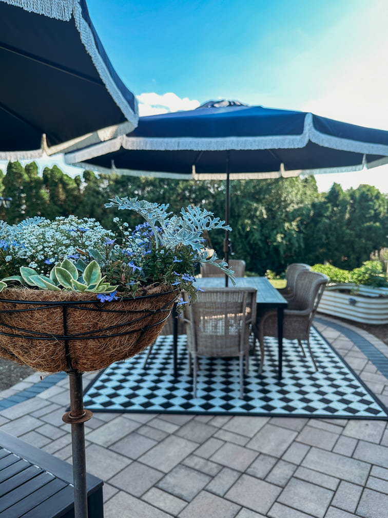 outdoor patio with english cottage inspired home accents