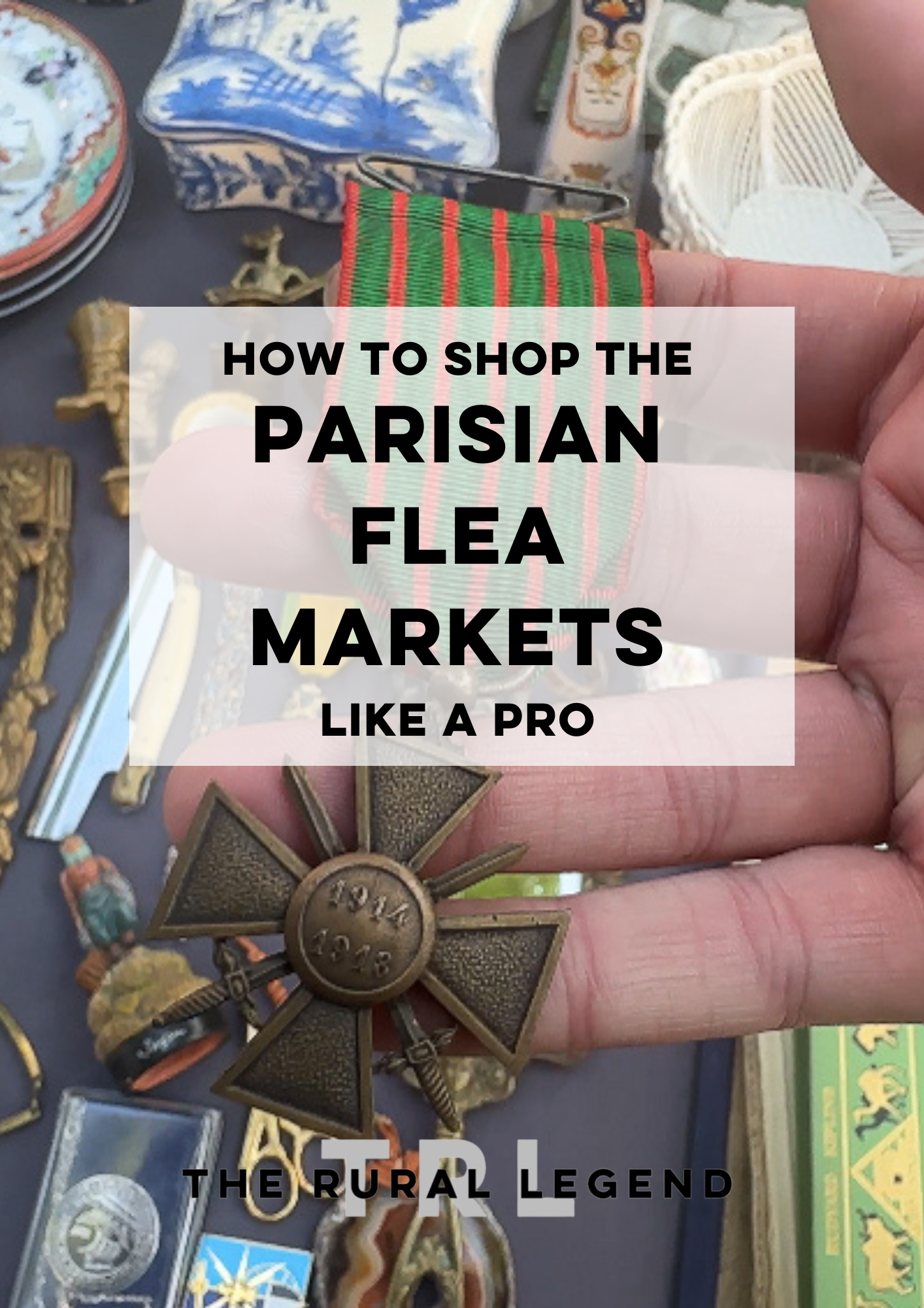 a person showing an antique medal at a paris flea market