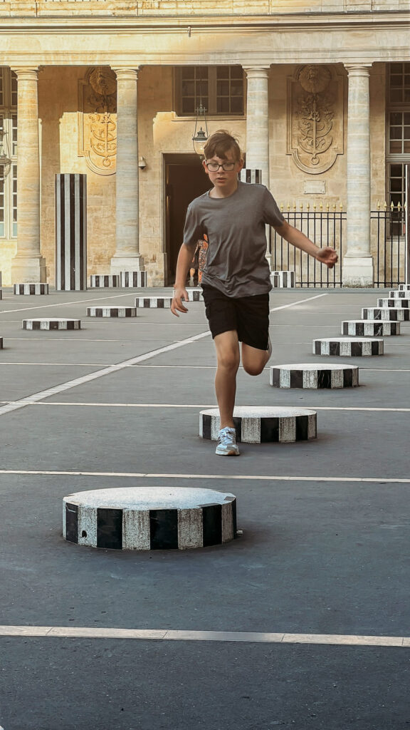 the boy is running in Palais Royale