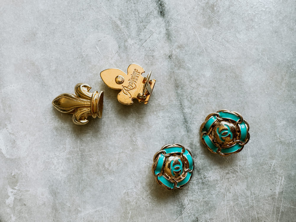 Fleur de Lis clip on earrings and Chanel clip on earrings both from a flea market in Paris